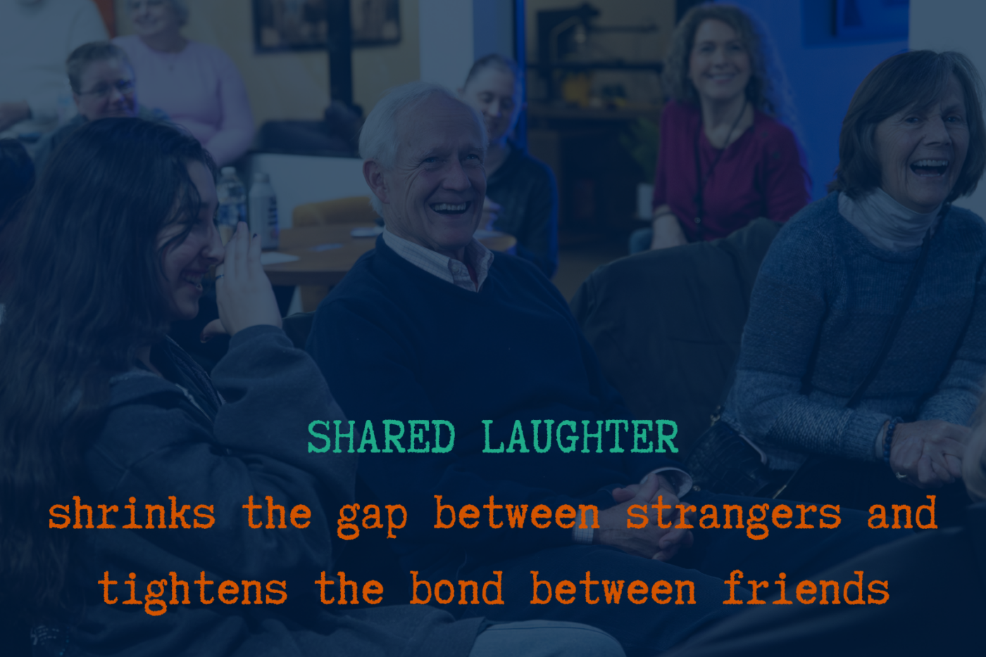 Strangers laughing together, illustrating a blog post about connection, shared laughter and why Mo Barrett performs live shows.